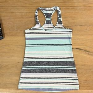 Lululemon size 8 Cool Racerback tank top. Striped: aqua, purple, black, white